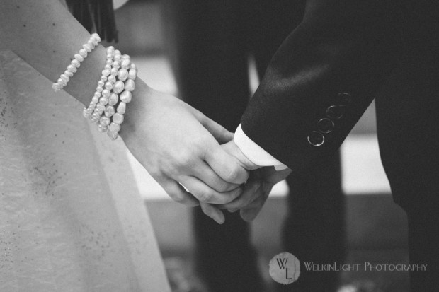 Holding Hands at Wedding